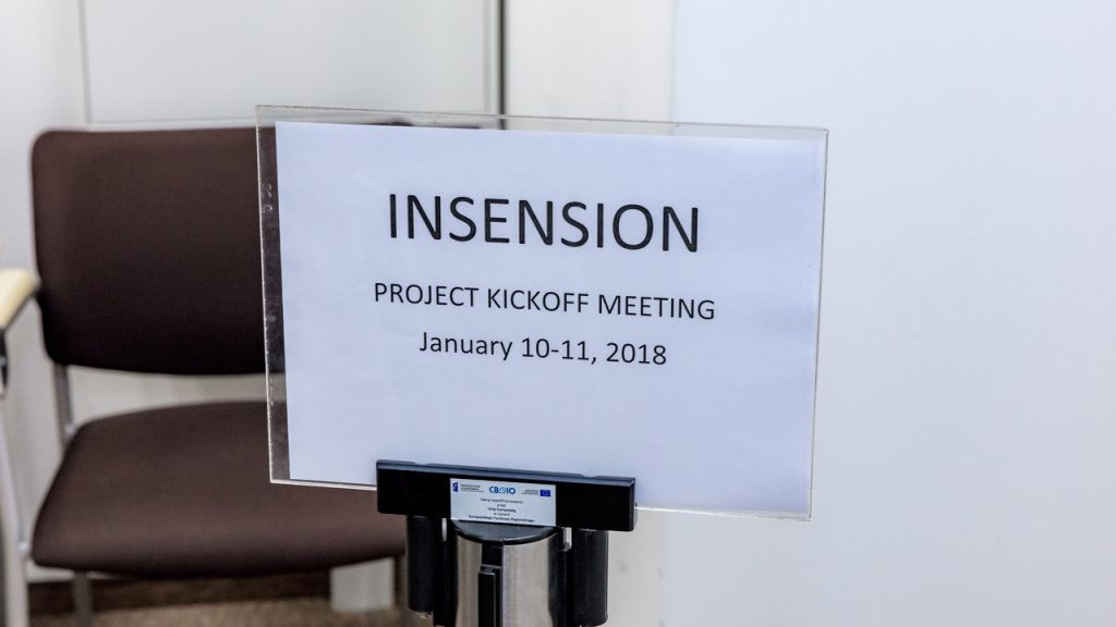 A card with the date of the INSENSION meeting